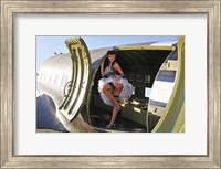 Framed Sexy 1940's style pin-up girl standing inside of a C-47 Skytrain aircraft