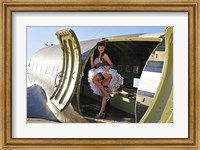 Framed Sexy 1940's style pin-up girl standing inside of a C-47 Skytrain aircraft