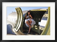 Framed Sexy 1940's style pin-up girl standing inside of a C-47 Skytrain aircraft