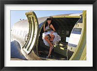 Framed Sexy 1940's style pin-up girl standing inside of a C-47 Skytrain aircraft