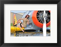 Framed 1940's style pin-up girl posing on a T-6 aircraft