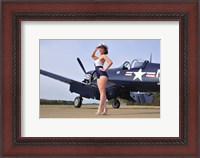 Framed 1940's Navy pin-up girl posing with a vintage Corsair aircraft