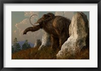 Framed mammoth standing among stones on a hillside