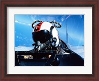 Framed pilot sitting in the back of a two-seater F-14 Tomcat