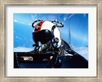 Framed pilot sitting in the back of a two-seater F-14 Tomcat