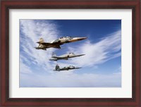 Framed F-5F Tiger II leads two F-5E's during a training flight