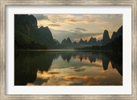 Framed Li River and karst peaks at sunrise, Guilin, China