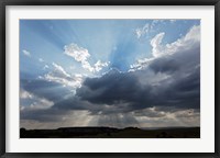 Framed Light beams  through clouds, Maasai Mara, Kenya