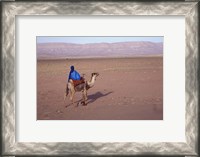 Framed Man in Traditional Dress Riding Camel, Morocco