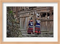 Framed Langde Miao girls in traditional costume in the village, Kaili, Guizhou, China