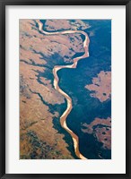 Framed River flowing through land below, Madagascar