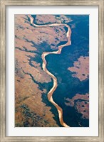 Framed River flowing through land below, Madagascar