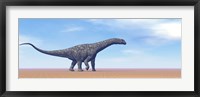 Framed Large Argentinosaurus dinosaur walking in the desert