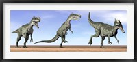 Framed Three Monolophosaurus dinosaurs standing in the desert