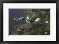 Framed Saab 105 jets flying in formation