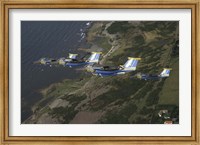Framed Saab 105 jets flying in formation