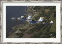 Framed Saab 105 jets flying in formation