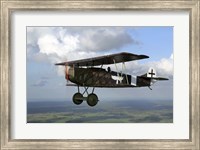 Framed Fokker DVII World War I replica fighter in the air