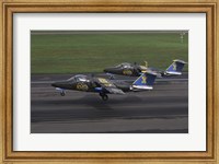 Framed Saab 105 jet trainers on the strip
