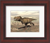 Framed Tyrannosaurus Rex dinosaur running across rocky terrain