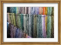 Framed China, Suzhou. Hanging silk threads, market