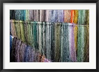 Framed China, Suzhou. Hanging silk threads, market
