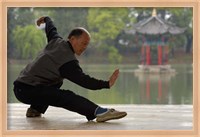 Framed Man Doing Tai Chi Exercises at Black Dragon Pool with One-Cent Pavilion, Lijiang, Yunnan Province, China