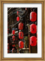 Framed Old Town red lanterns outside restaurants, Xinhua Jie Street, Lijiang, Yunnan Province, China