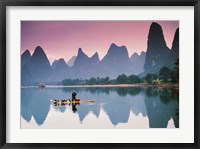 Framed Cormorant fishing at dusk, Li river, Guangxi, China