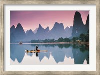 Framed Cormorant fishing at dusk, Li river, Guangxi, China