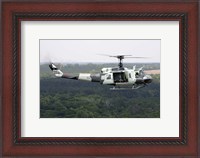Framed US Air Force UH-1H Huey in an experiment paint scheme