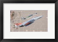 Framed Two QF-4E Phantom II drones break over Holloman Air Force Base, New Mexico