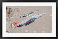 Framed Two QF-4E Phantom II drones break over Holloman Air Force Base, New Mexico