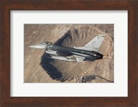 Framed F-16C Fighting Falcon flying above Arizona's Meteor Crater