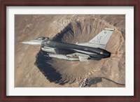 Framed F-16C Fighting Falcon flying above Arizona's Meteor Crater