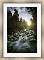 Framed Small river flowing over large stones at sunset, Pirin National Park, Bulgaria