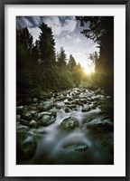 Framed Small river flowing over large stones at sunset, Pirin National Park, Bulgaria