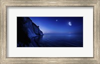 Framed Moon rising over tranquil sea and Mons Klint cliffs, Denmark