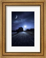 Framed road in a park at night against moon and moody sky, Moscow, Russia