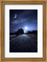 Framed road in a park at night against moon and moody sky, Moscow, Russia
