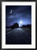 Framed road in a park at night against moon and moody sky, Moscow, Russia