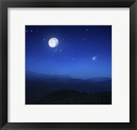 Framed Mountain range on a misty night with moon, starry sky and falling meteorite