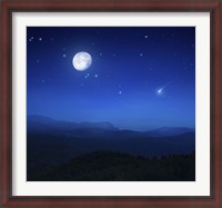 Framed Mountain range on a misty night with moon, starry sky and falling meteorite
