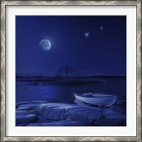 Framed boat moored near an icy stone in a lake against starry sky, Finland