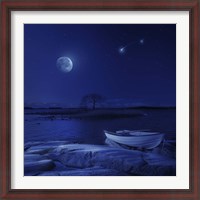 Framed boat moored near an icy stone in a lake against starry sky, Finland