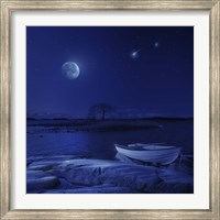 Framed boat moored near an icy stone in a lake against starry sky, Finland