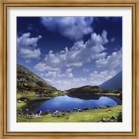 Framed Blue lake in the Pirin Mountains over tranquil clouds, Pirin National Park, Bulgaria