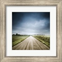 Framed Country road through fields, Denmark