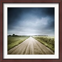 Framed Country road through fields, Denmark