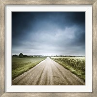 Framed Country road through fields, Denmark